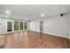 Spacious basement features wood-look flooring, multiple windows, and recessed lighting at 4528 Lashley Ne Ct, Marietta, GA 30068