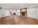 Spacious basement Gathering room features a fireplace, built-in shelves, and wood-look floors at 4528 Lashley Ne Ct, Marietta, GA 30068