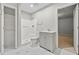 Bathroom features white vanity, marble floors, and walk-in shower at 4528 Lashley Ne Ct, Marietta, GA 30068