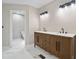 Bathroom featuring a modern vanity with double sinks and stylish lighting, perfect for a luxurious feel at 4528 Lashley Ne Ct, Marietta, GA 30068