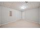This bedroom features carpet floors, neutral walls, and a double closet at 4528 Lashley Ne Ct, Marietta, GA 30068