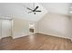 Spacious main bedroom with vaulted ceiling and fan leading to an en-suite bathroom for added privacy at 4528 Lashley Ne Ct, Marietta, GA 30068