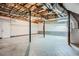 Unfinished basement with exposed ceiling, concrete floor, and utility connections at 520 White Pines Dr, Dallas, GA 30157