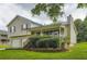 Charming two-story home featuring a welcoming front porch, a two-car garage, and a well-maintained lawn at 520 White Pines Dr, Dallas, GA 30157
