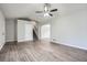 Bright living room with luxury vinyl plank flooring, neutral paint and a staircase at 520 White Pines Dr, Dallas, GA 30157