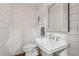 Charming powder room with shiplap walls, vessel sink, stylish mirror, and designer fixtures at 5349 Forest Springs Dr, Dunwoody, GA 30338
