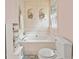 Bathroom featuring a soaking tub with painted botanical accents above the tub at 6355 Autumn View Nw Pt, Acworth, GA 30101