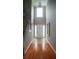 Grand foyer featuring hardwood floors, high ceilings, and a chandelier at 1332 Chandler Cove Way, Grayson, GA 30017