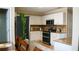 Eat-in kitchen with stainless steel appliances and light colored cabinetry at 1332 Chandler Cove Way, Grayson, GA 30017