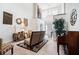 Bright living room with two-story ceilings, neutral carpet, piano and open floor plan at 2512 Halcyon Way, Lawrenceville, GA 30044