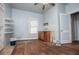 Bedroom featuring hardwood floors, shelving and ceiling fan at 6539 E Strickland St, Douglasville, GA 30134