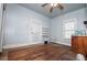 Bedroom featuring hardwood floors, natural light and ceiling fan at 6539 E Strickland St, Douglasville, GA 30134