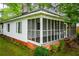 Charming home with a screened-in porch, perfect for outdoor living at 6539 E Strickland St, Douglasville, GA 30134
