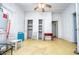 Room with water heater, ceiling fan, and natural light at 6539 E Strickland St, Douglasville, GA 30134