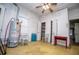 Room with water heater, ceiling fan, and natural light at 6539 E Strickland St, Douglasville, GA 30134