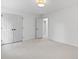 Spacious bedroom features neutral carpet, overhead lighting and access to walk-in closet at 1017 Mill Creek Ne Mnr, Brookhaven, GA 30319