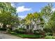 Charming two-story home with lush landscaping and mature trees enhancing curb appeal at 1017 Mill Creek Ne Mnr, Brookhaven, GA 30319