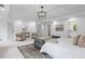 Spacious main bedroom featuring neutral paint, ceiling fan, and carpeted floors at 1017 Mill Creek Ne Mnr, Brookhaven, GA 30319