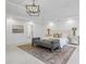 Main bedroom featuring neutral paint, ceiling fan, and carpeted floors at 1017 Mill Creek Ne Mnr, Brookhaven, GA 30319