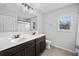 Modern bathroom featuring a double sink vanity, bright mirror, and stylish fixtures at 2767 Nw Magnolia Creek Dr, Kennesaw, GA 30152