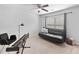 Relaxing bedroom features a futon, electric piano, and plenty of natural light at 2767 Nw Magnolia Creek Dr, Kennesaw, GA 30152