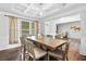Bright dining room with coffered ceilings and large windows for ample natural light at 2767 Nw Magnolia Creek Dr, Kennesaw, GA 30152