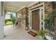 Charming front entrance with a covered porch, stone accents, and well-maintained landscaping, offering a warm welcome at 2767 Nw Magnolia Creek Dr, Kennesaw, GA 30152
