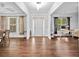 Inviting foyer with hardwood flooring, offering a view to a office space at 2767 Nw Magnolia Creek Dr, Kennesaw, GA 30152