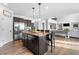Spacious kitchen featuring stainless steel appliances, a large island, and hardwood floors at 2767 Nw Magnolia Creek Dr, Kennesaw, GA 30152