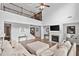 Open living room with soaring ceilings, fireplace, and an open staircase to the second level at 2767 Nw Magnolia Creek Dr, Kennesaw, GA 30152