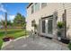 Inviting outdoor patio with seating, potted plants, and charming string lights at 2767 Nw Magnolia Creek Dr, Kennesaw, GA 30152