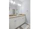 Bathroom featuring double sinks, granite countertops, and white cabinetry at 2941 Elizabeth Se St, Smyrna, GA 30080