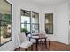 Bright breakfast nook with views of the outdoor patio and seating for two at 2941 Elizabeth Se St, Smyrna, GA 30080