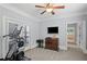 Comfortable exercise area with an elliptical machine and access to the backyard at 2941 Elizabeth Se St, Smyrna, GA 30080