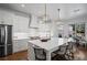 Beautiful kitchen with a large island, stainless steel appliances, pendant lighting, and breakfast nook views at 2941 Elizabeth Se St, Smyrna, GA 30080