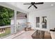 Cozy screened porch with a view of the backyard and outdoor seating area at 2941 Elizabeth Se St, Smyrna, GA 30080
