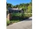 Charming home with wrought iron gate and a large front yard at 435 Johnson Ferry Nw Rd, Atlanta, GA 30328
