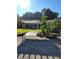 A rustic pergola graces this yard with a charming countryside appeal at 435 Johnson Ferry Nw Rd, Atlanta, GA 30328
