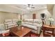 Cozy basement area featuring seating, a ceiling fan and stylish decorations at 150 Henderson Farm Dr, Woodstock, GA 30188