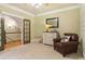 Inviting bedroom featuring a comfortable chair, bear pillow and sunny window at 150 Henderson Farm Dr, Woodstock, GA 30188