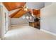 Living space with a wood ceiling, carpeted floors, and kitchenette area at 150 Henderson Farm Dr, Woodstock, GA 30188