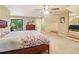 Large main bedroom with a king bed, dresser, and access to an outdoor balcony at 150 Henderson Farm Dr, Woodstock, GA 30188