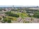 Aerial view of townhomes next to a park, with city buildings in background at 2501 Painted Buckeye Chase Se, Smyrna, GA 30080