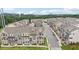 Picturesque aerial view of a tree-lined neighborhood featuring stylish multi-story townhomes at 2501 Painted Buckeye Chase Se, Smyrna, GA 30080