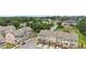 Stylish townhomes featuring a back deck overlooking a two-car garage and lush landscaping at 2501 Painted Buckeye Chase Se, Smyrna, GA 30080