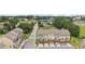 Scenic aerial view of a neighborhood with townhomes featuring a back deck and two-car garage at 2501 Painted Buckeye Chase Se, Smyrna, GA 30080