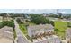 Scenic aerial view of a neighborhood with townhomes featuring a back deck and two-car garage at 2501 Painted Buckeye Chase Se, Smyrna, GA 30080