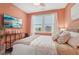 Comfortable bedroom with natural light, TV, and decor at 2501 Painted Buckeye Chase Se, Smyrna, GA 30080