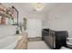 Charming Bedroom with changing table, black crib, and a unique lighting fixture at 2501 Painted Buckeye Chase Se, Smyrna, GA 30080