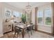 Inviting dining room featuring a chandelier, modern decor, and hardwood flooring at 2501 Painted Buckeye Chase Se, Smyrna, GA 30080